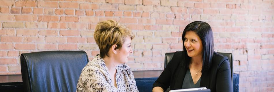 Real estate agent using CRM software to manage client relationships