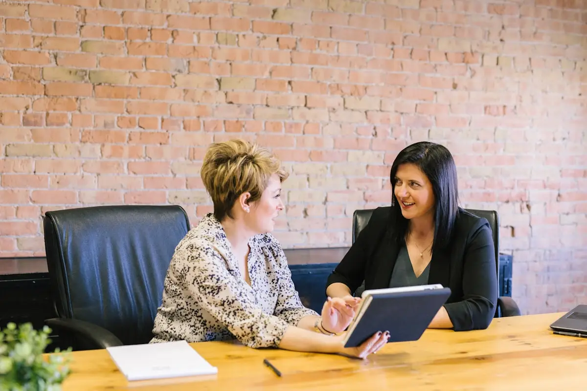 Real estate agent using CRM software to manage client relationships